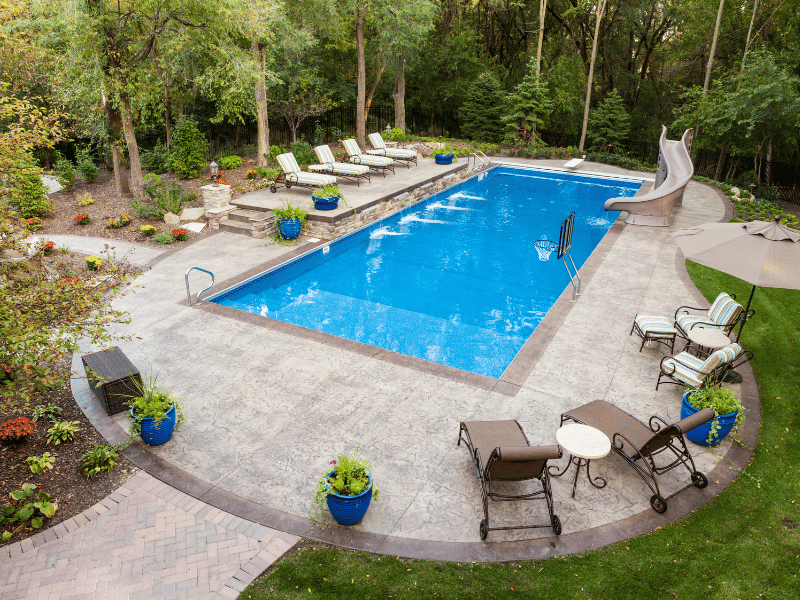 backyard inground concrete type of pool